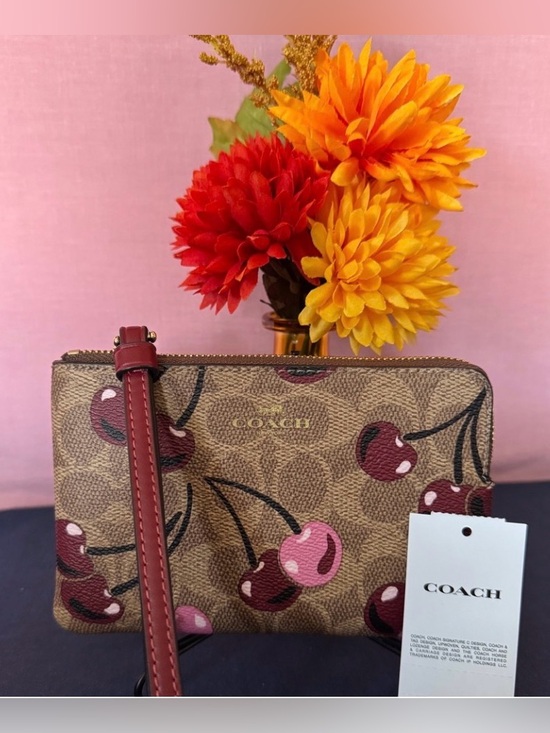 Coach Handbags - NWT Coach Ltd Ed Cherry Print corner zip wristlet